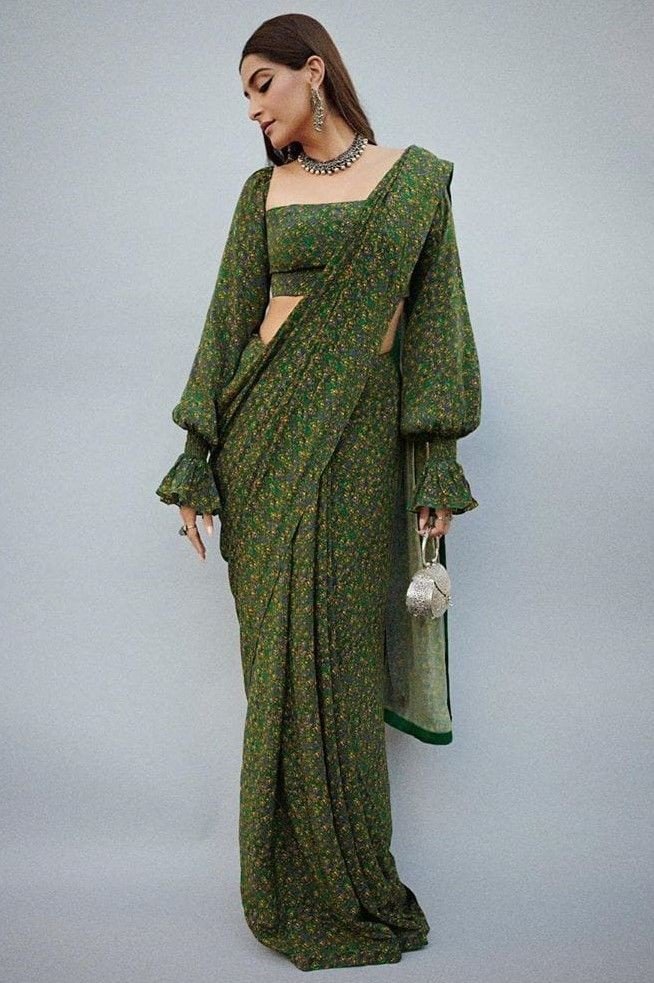 Emerald green saree with cough sleeve blouse